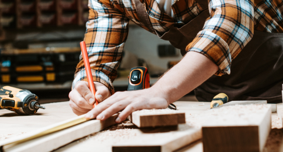 person working with wood
